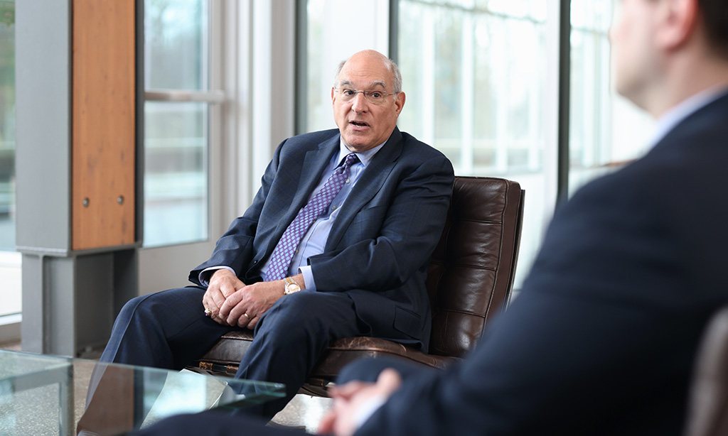 An attorney in conversation in the Hassakis & Hassakis case study